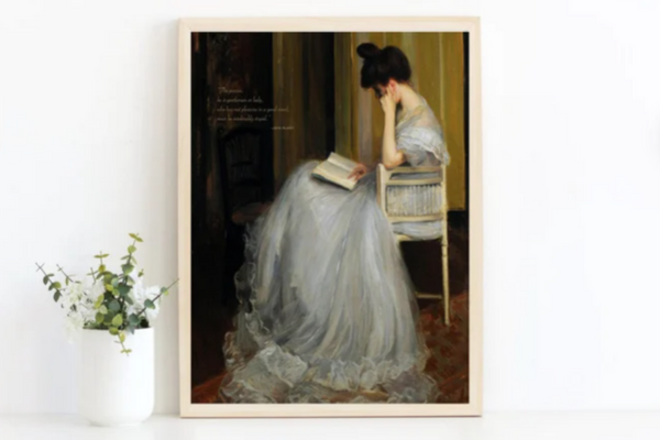 Artwork featuring a woman in a floorlength pastel blue dress reading a book in profile while sitting in a chair. A quote from Northanger Abbey is added in the left-hand corner.