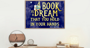 a photo of a wall with a poster that says, "A book is a dream that you hold in your hands" by Neil Gaiman
