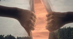 Image of two hands pulling the sky apart