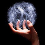 a photo of a hand with a globe of smoke in it