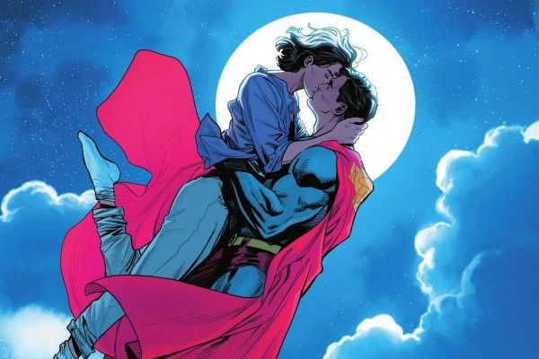 Part of a page from Action Comics #1035, showing Superman and Lois flying through the night sky, kissing, with the full moon illuminating them.