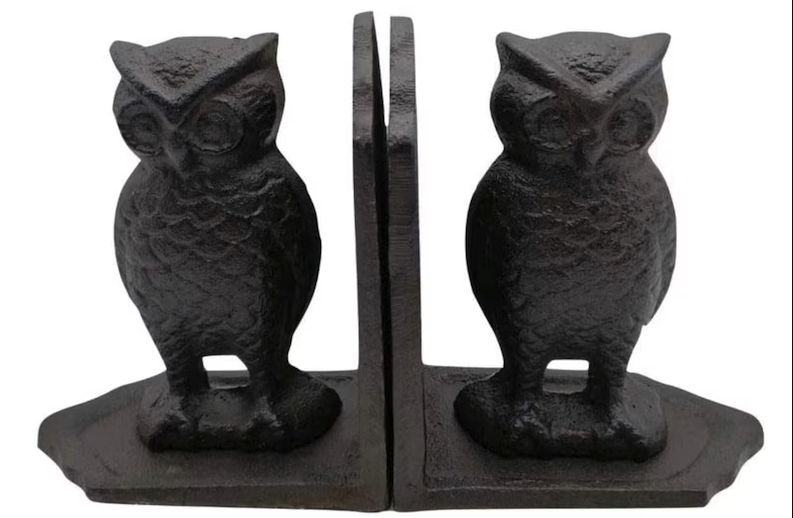 two cast iron owl bookends side by side
