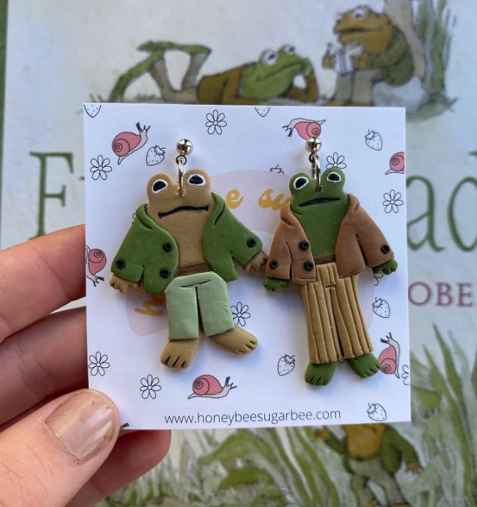 Image of clay earrings honoring Frog and Toad. 