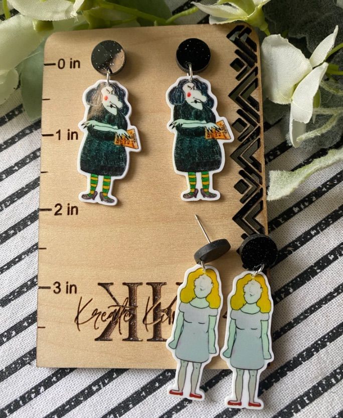 Image of two sets of earrings. One is Miss Nelson and one if Viola Swamp. 