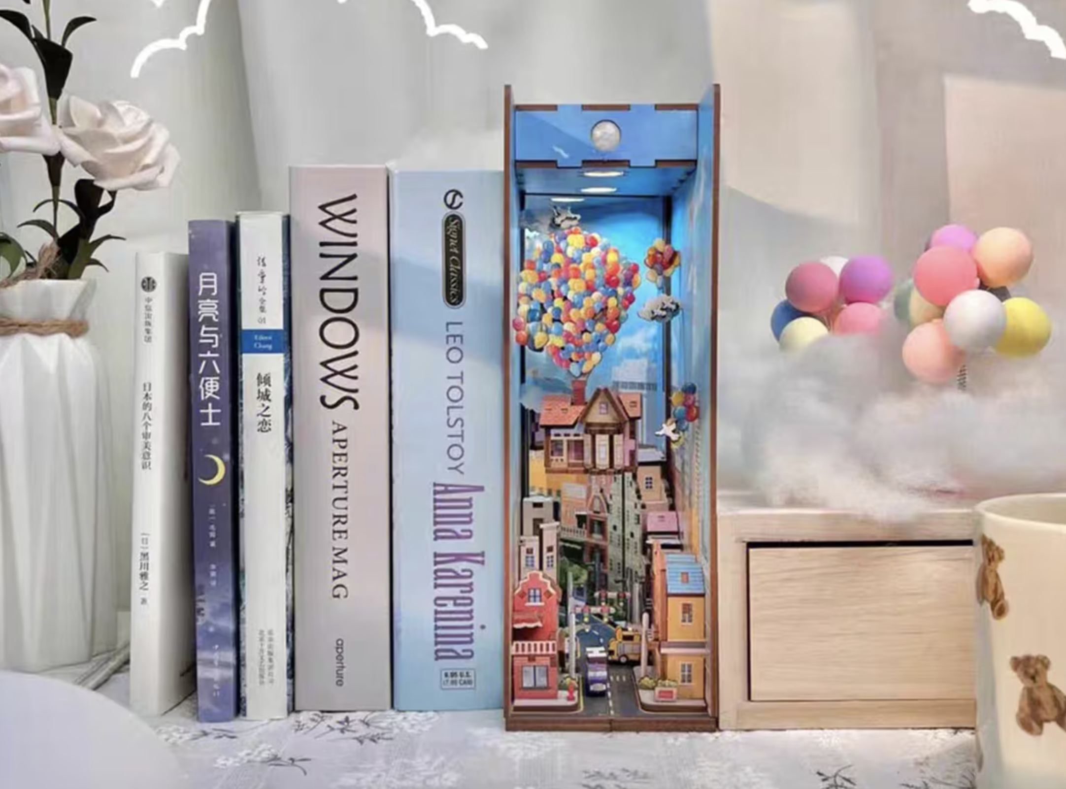 Book Nook Showing a Small Village with Balloons like "UP"