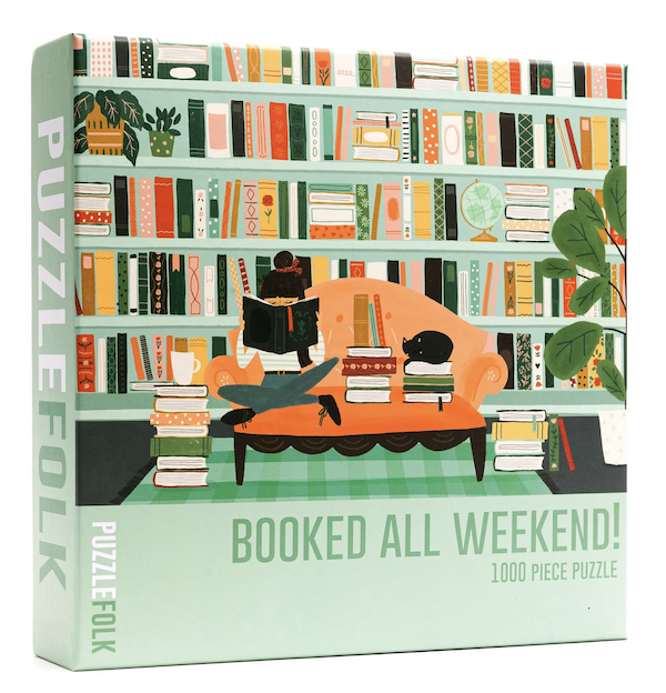 jigsaw puzzle illustration of person reading on sofa with couch an da background of bookshelves filled with books