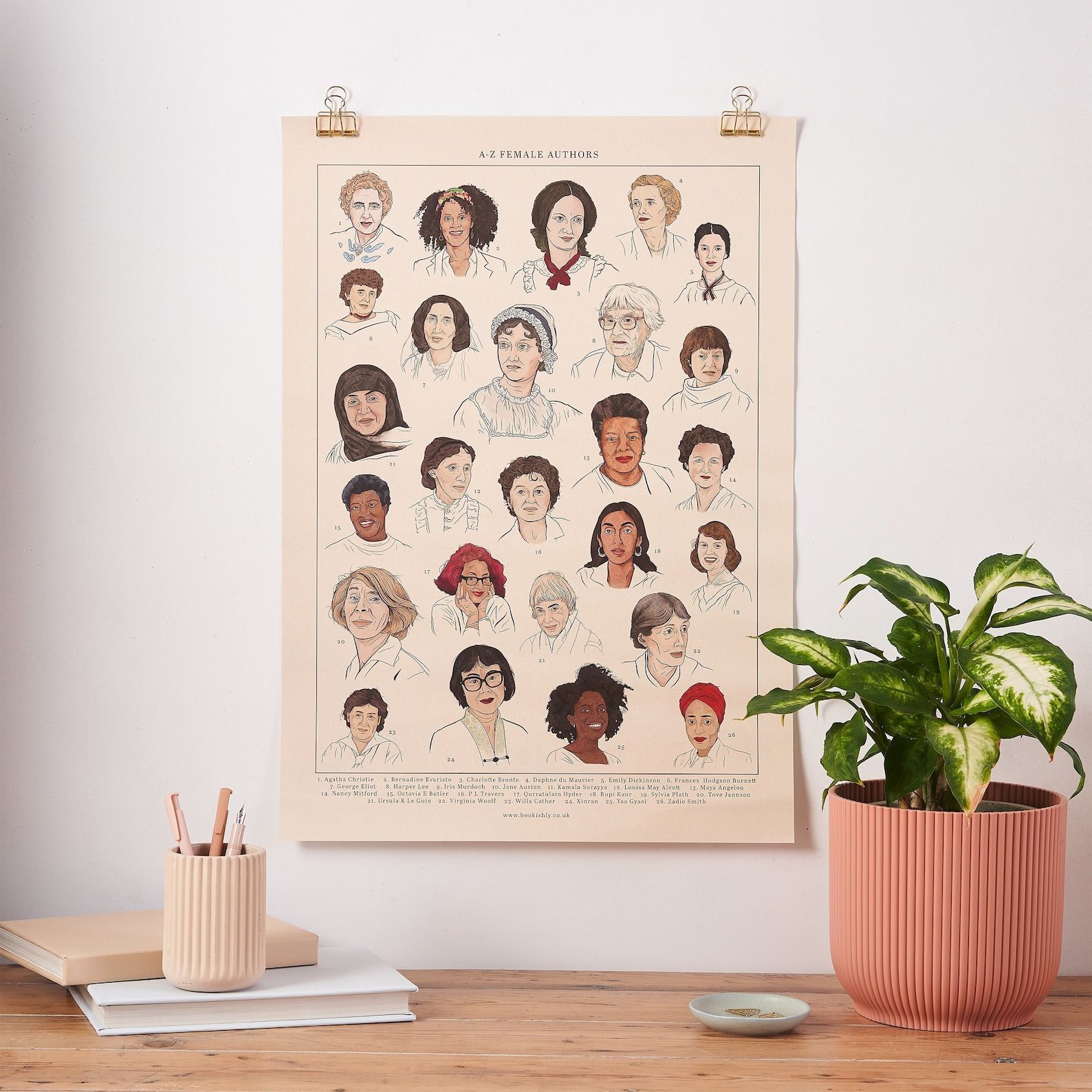 A vellum poster with the busts of twenty-six female famous female authors