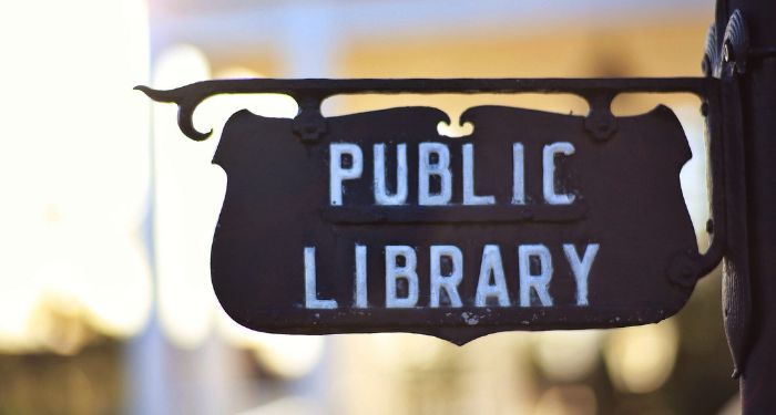 Image of a sign that reads "public library"
