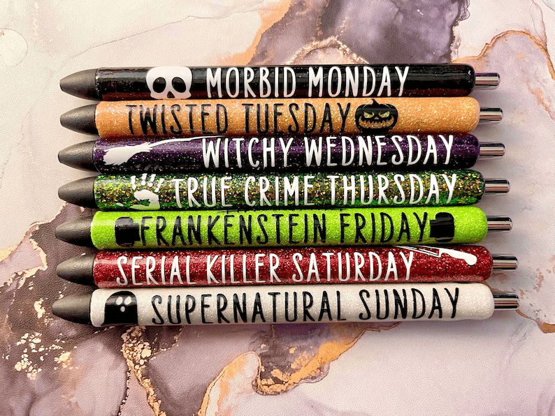 Photo of seven Halloween themed pens for each day of the week.