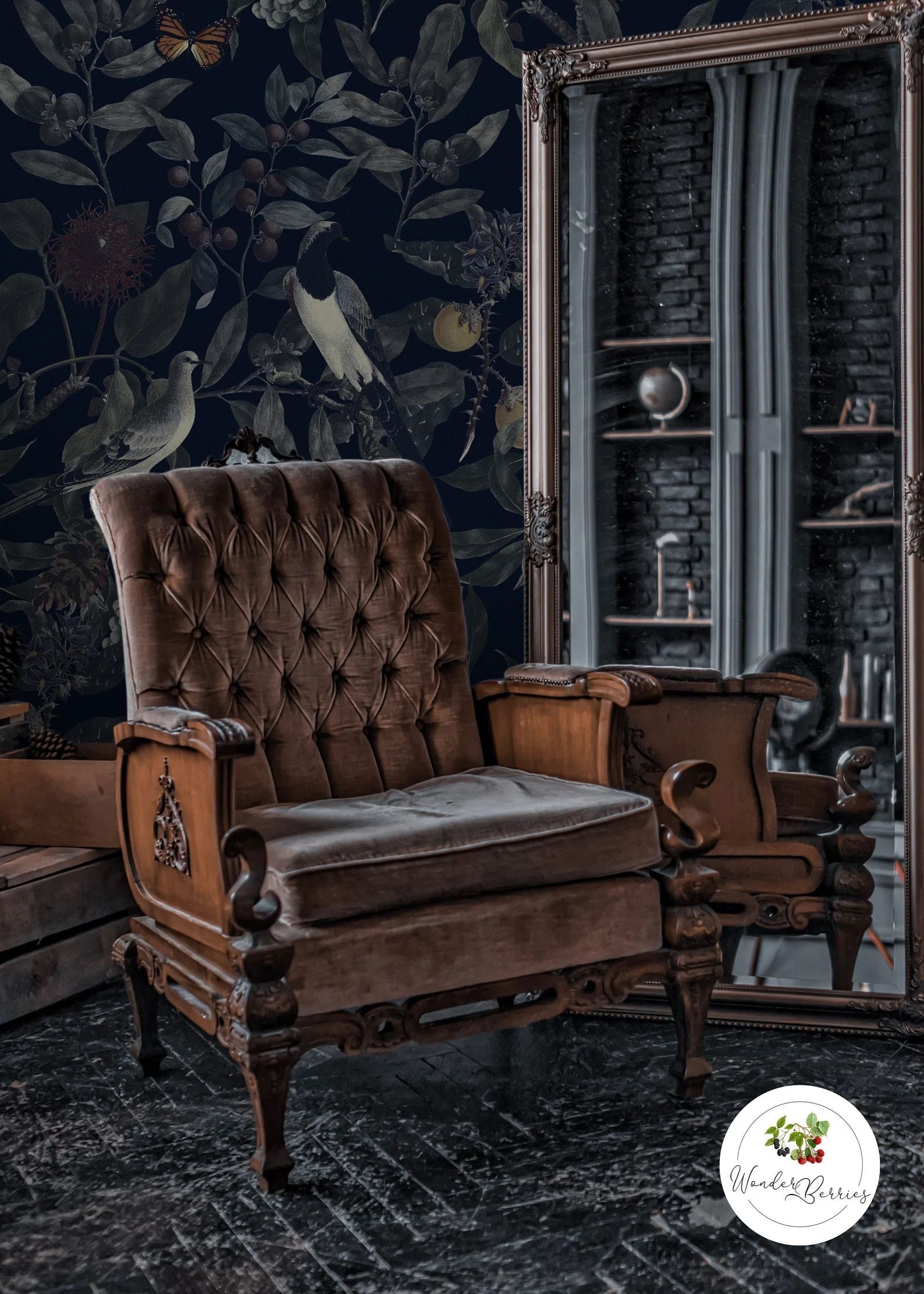 dark botanical wallpaper behind a leather chair