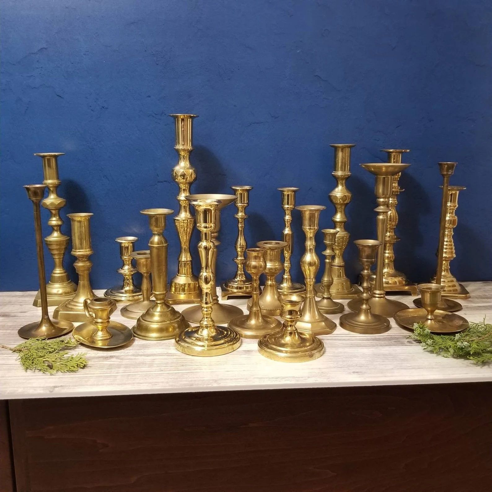 assorted brass candlesticks