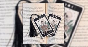 Skeleton with book tarot card bookmark labeled The Reader