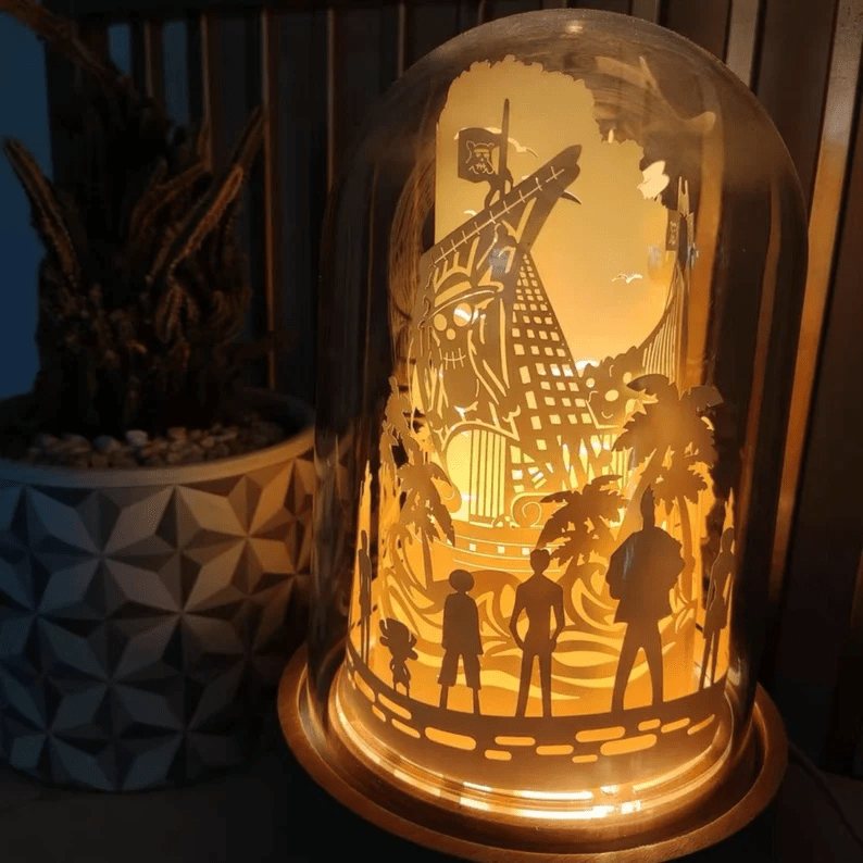 Photo of a lamp carved with paper where you can see the shadows of the characters