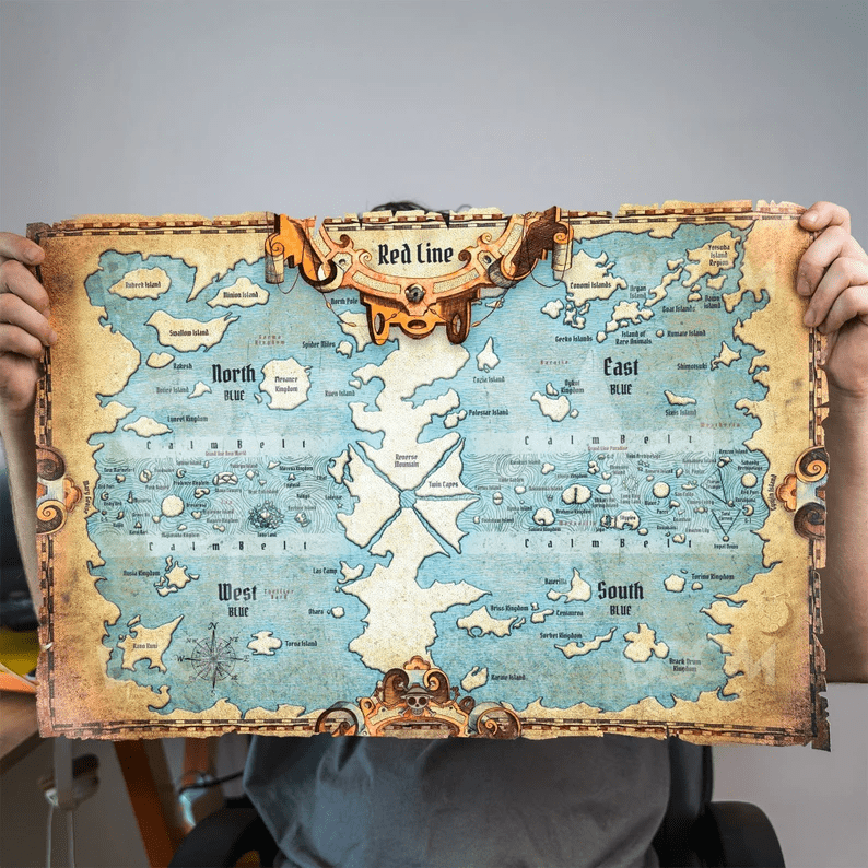 Photo of someone holding a canvas printed One Piece world map.