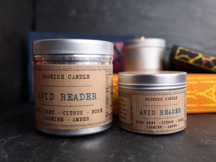 tin with label avid reader candle