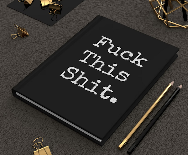 a hardcover journal with with text on the cover that says Fuck This Shit