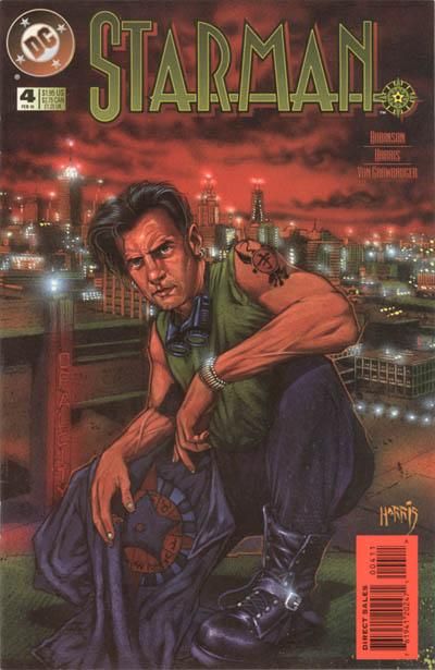The cover of Starman #4. Jack Knight is crouched on a roof. He is a white man with black hair, earrings, and tattoos, wearing a green tank top, black pants and boots, and holding a leather jacket. A pair of vintage goggles are hanging around his neck.