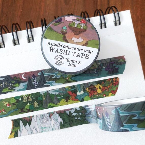 washi tape depicting fantasy scenery like mountains, rivers, and medieval structures 