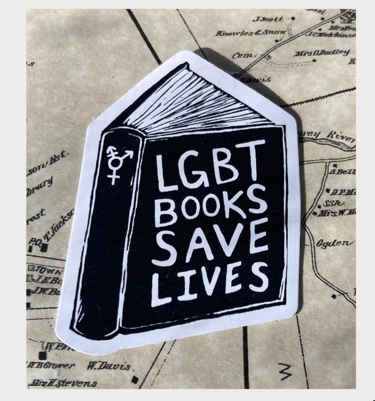 image of a black sticker with "lgbt books save lives" on the cover. 