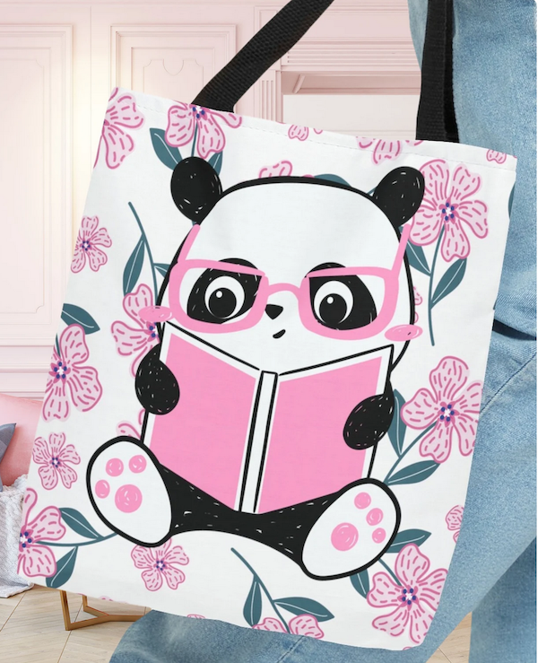 a tote bag with an illustration of a panda bear reading a pink book in pink glasses with pink flowers as background