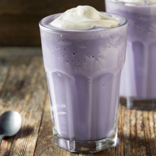 light purple-colored ube drink in two  glasses