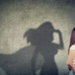 image of a person with a superhero shadow behind them
