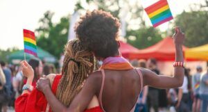 Image of a couple at a pride parade