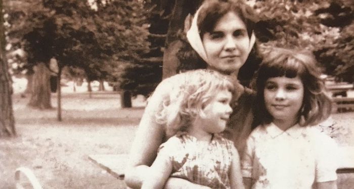 cropped cover of Lives of Mothers and Daughters showing Alice Munro with two kids on her lap
